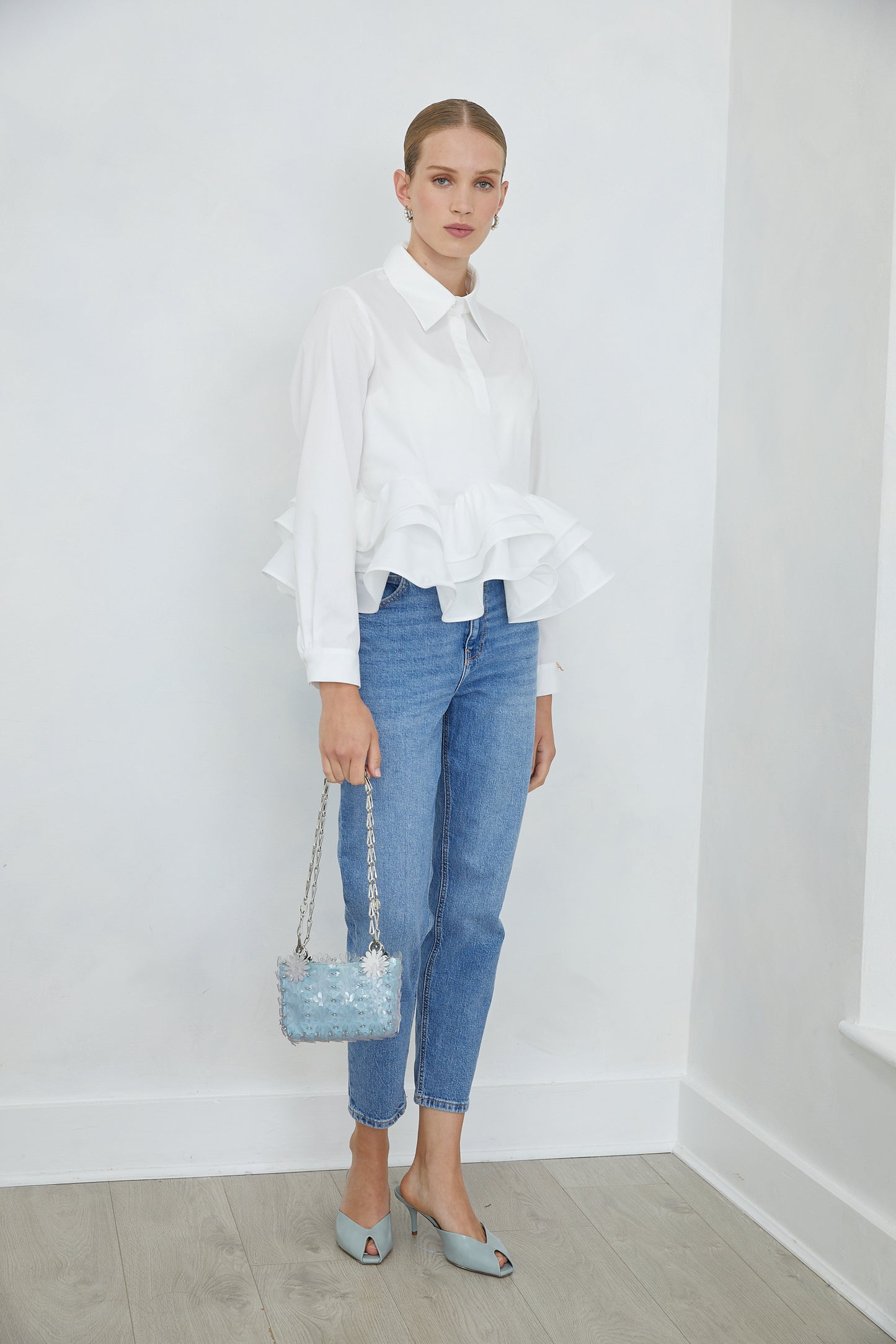 Carenza White Collared Peplum Shirt with Ruffle Hem