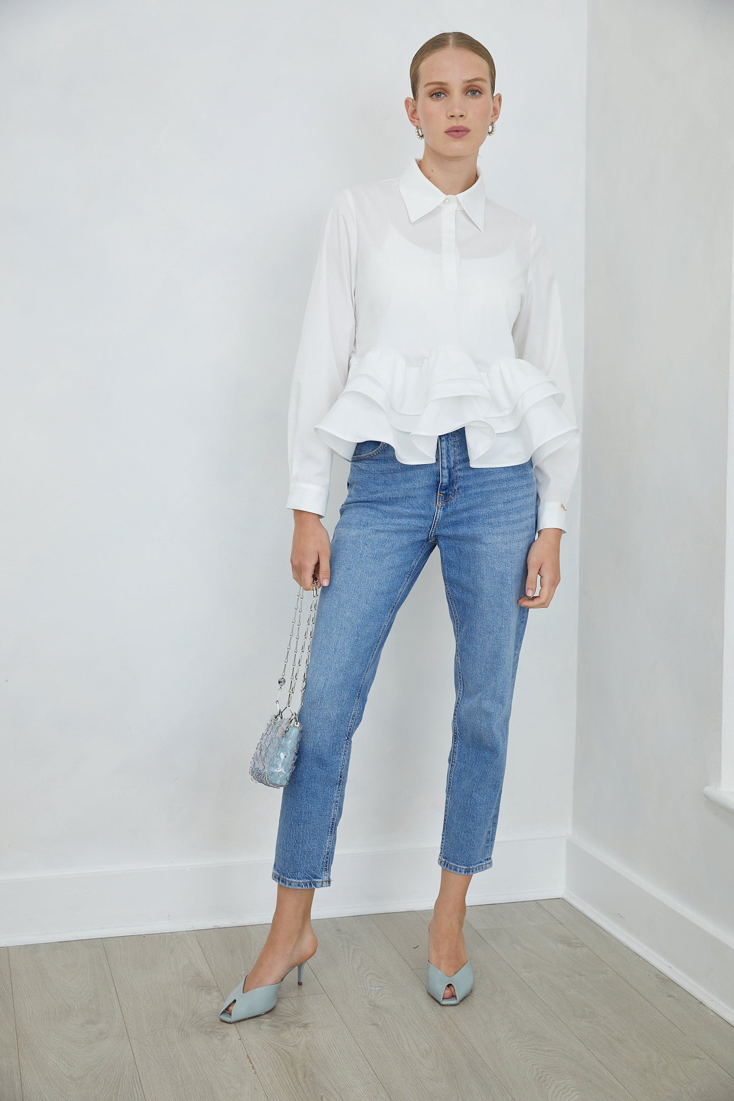 Carenza White Collared Peplum Shirt with Ruffle Hem