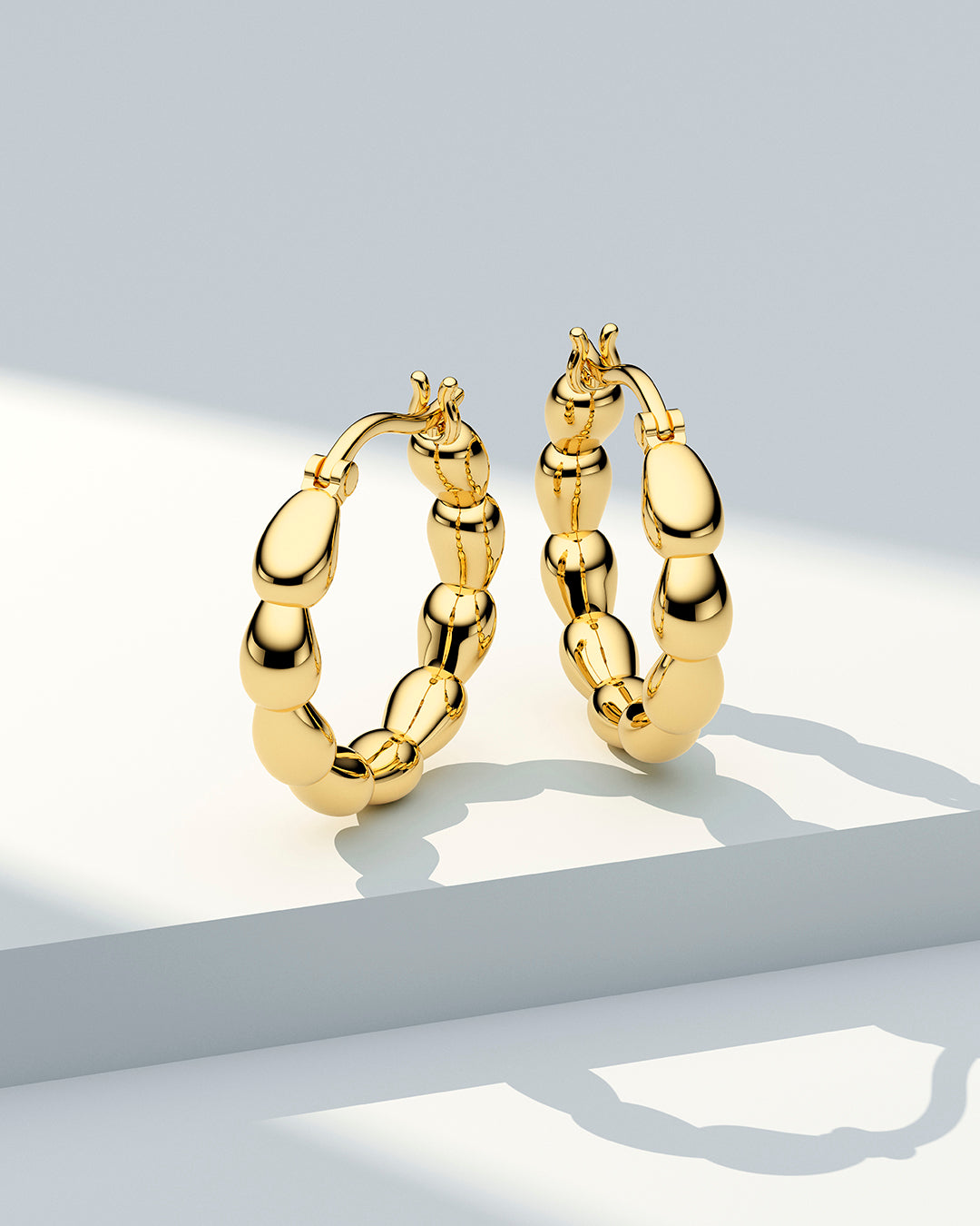 GOCCIA CERCHI PIANURA GRANDE 18k Gold Plated Sterling Silver Earrings